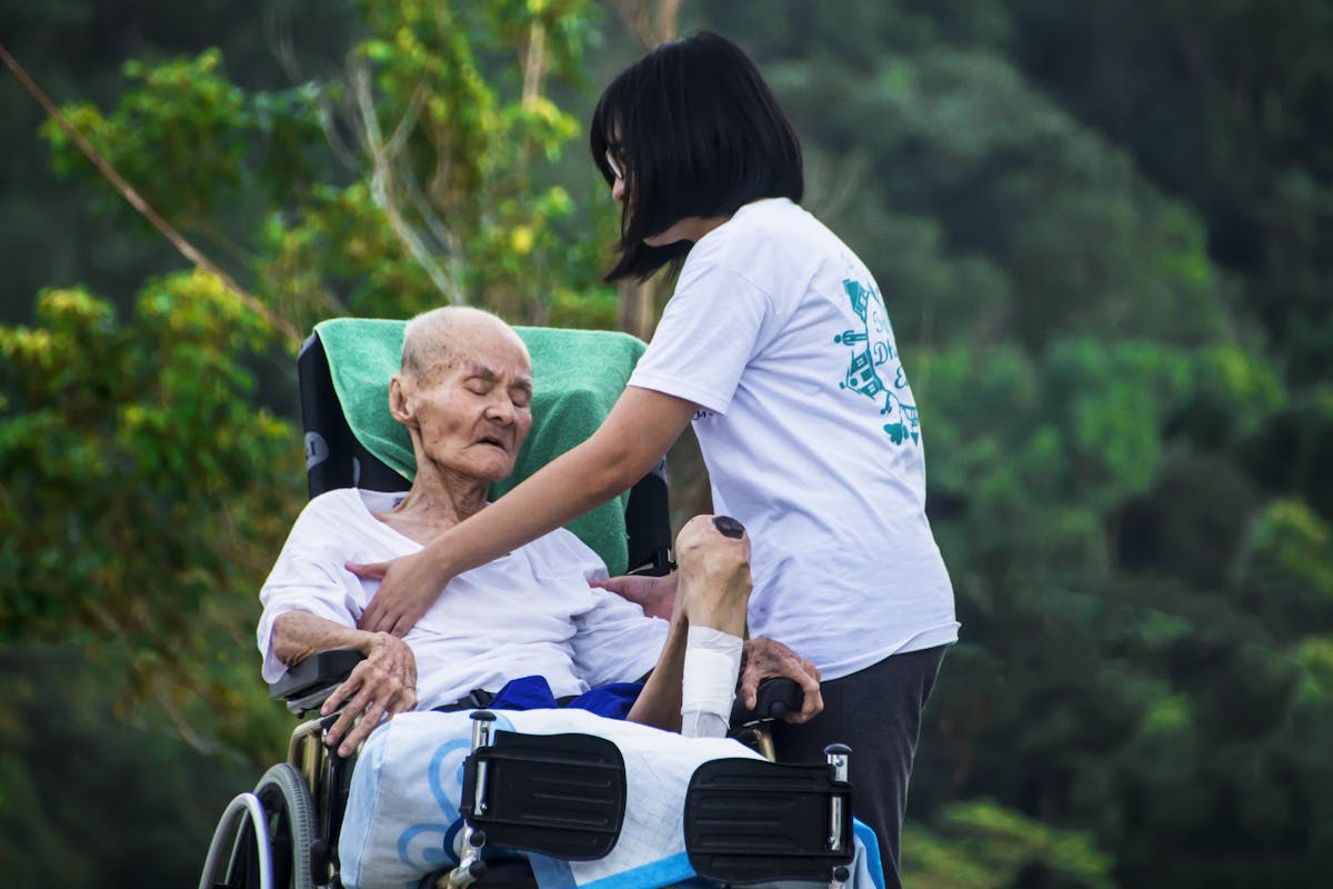 Caregiver assisting a patient